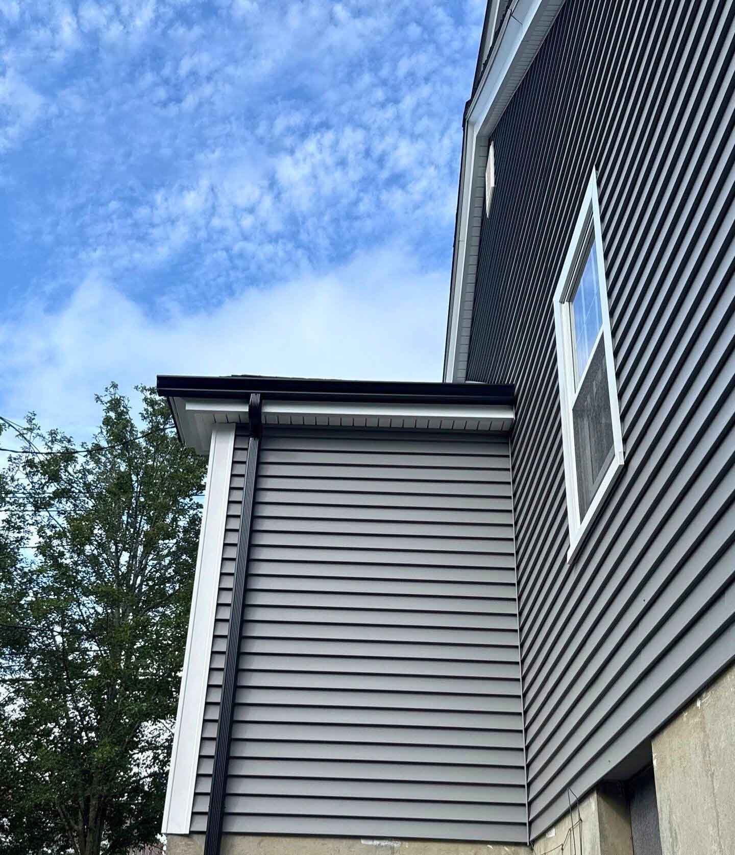 Premium salt-resistant siding installation on Narragansett beachfront property featuring coastal-grade materials and marine weatherproofing by 757 Exteriors