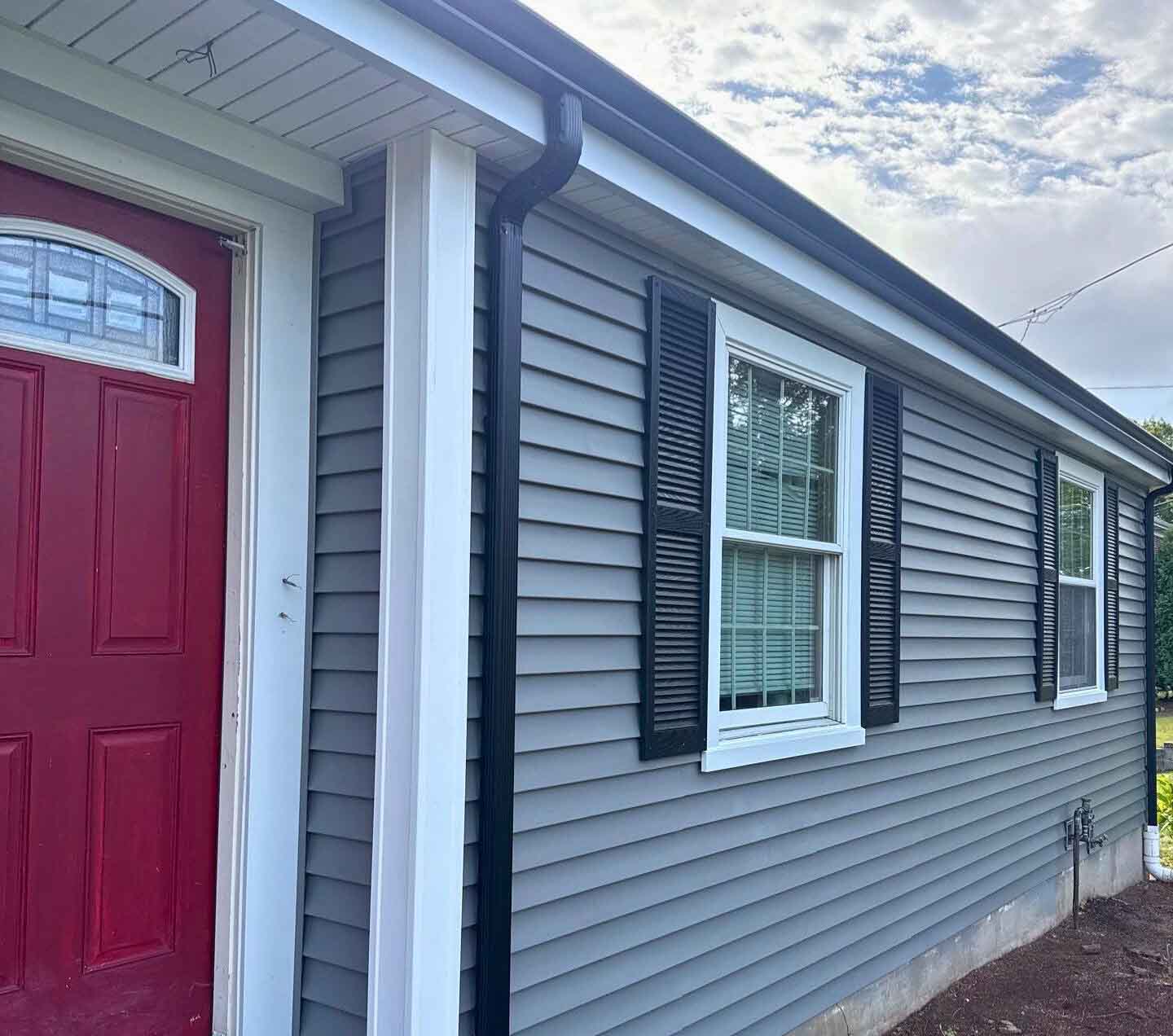 Professional siding installation on West Greenwich home featuring premium materials and expert craftsmanship by 757 Exteriors Inc