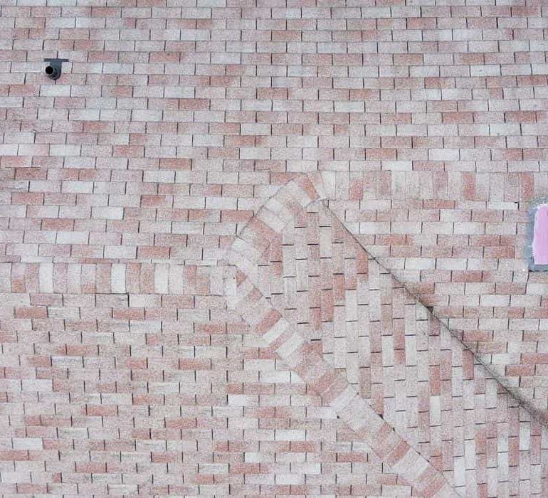 best roofing materials high wind areas Asphalt shingle roofing material installed on residential house roof designed for high wind and storm protection