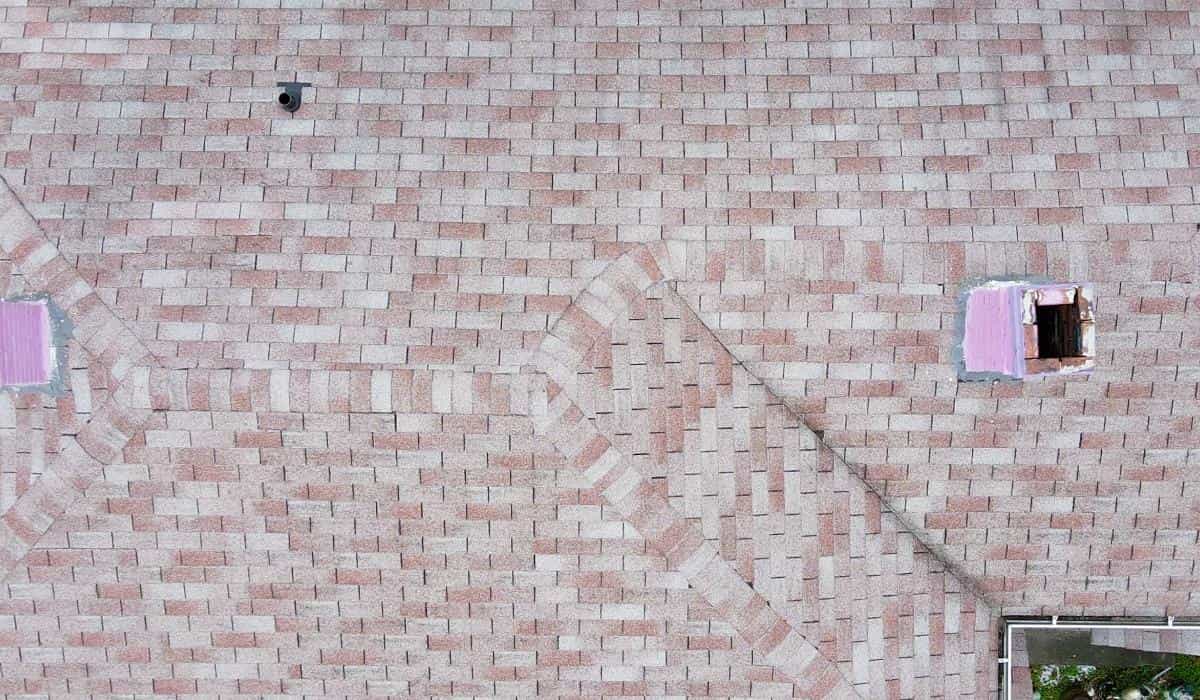 best roofing materials high wind areas Asphalt shingle roofing material installed on residential house roof designed for high wind and storm protection