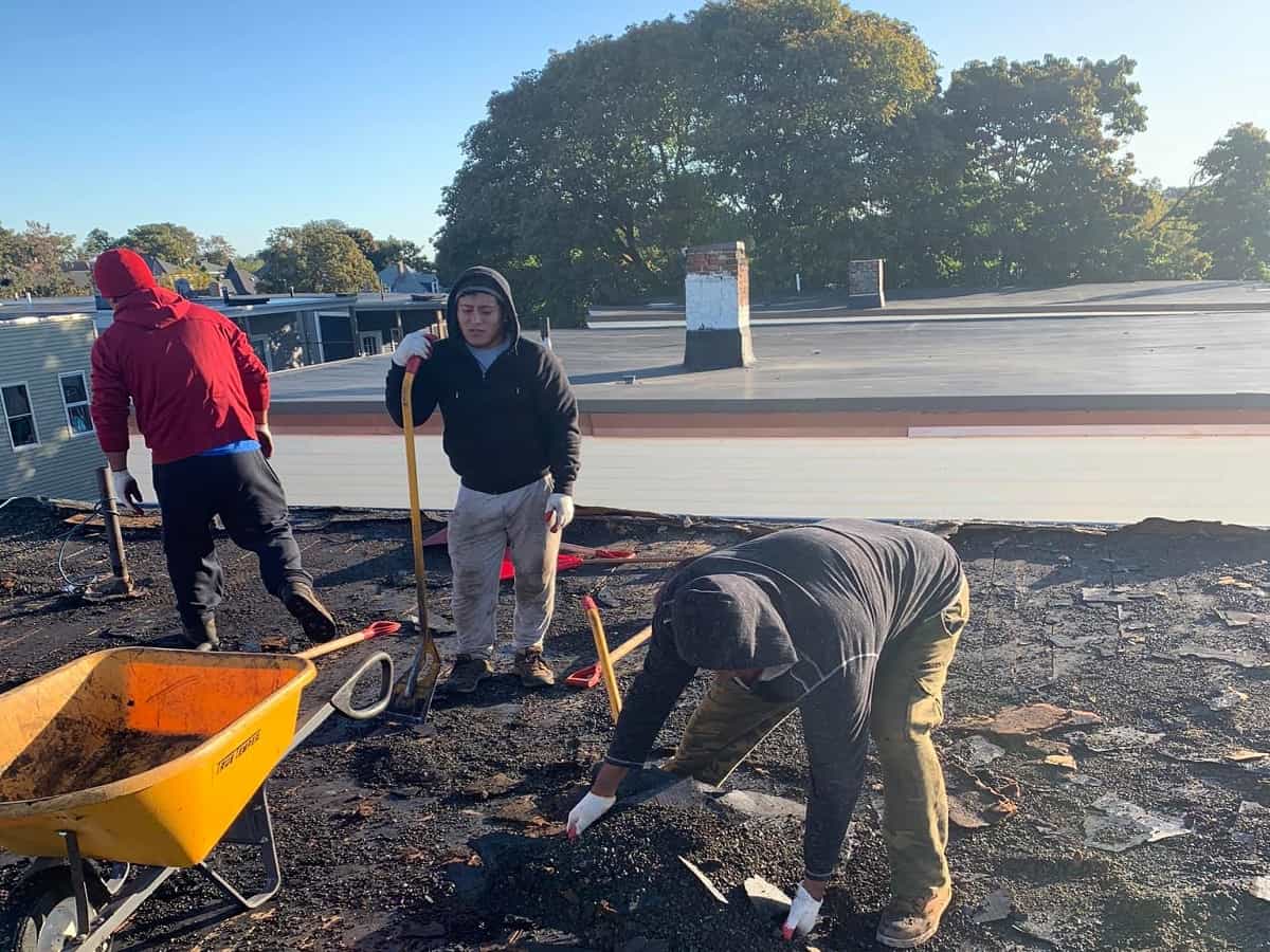 roofing company roof repair team working roofing-company-roof-repair-team-working